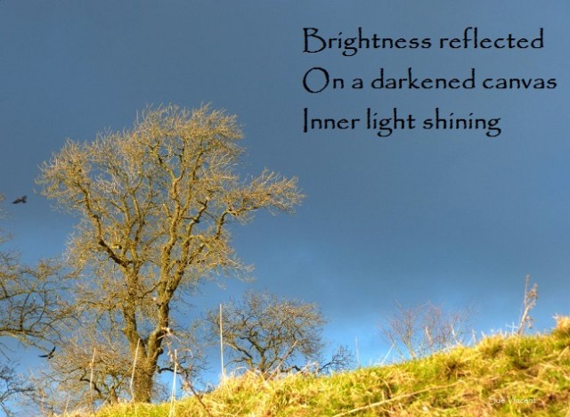 Brightness reflected on a darkened canvas Inner light shining