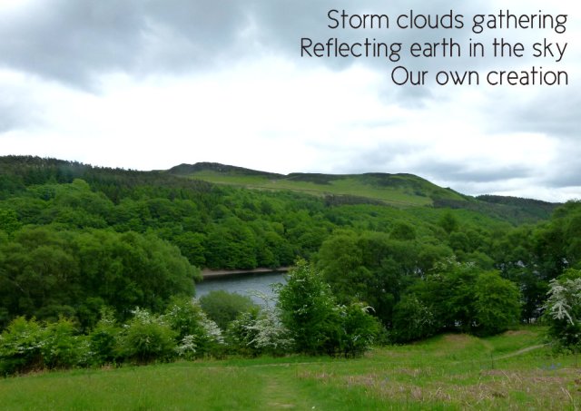 storm clouds gathering, reflecting earth in the sky, our own creation