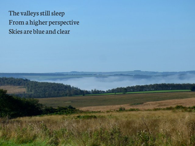 the-valleys-still-sleep-from-a-higher-perspective-skies-are-blue-and-clear